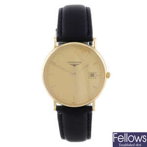 LONGINES - a gentleman's 18ct yellow gold wrist watch.