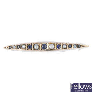 A late 19th century 9ct gold sapphire and split pearl brooch.