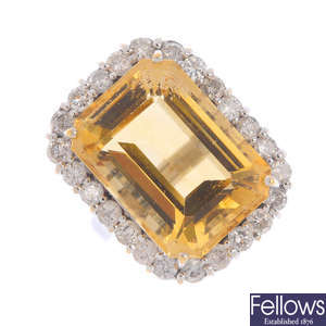 A citrine, diamond and synthetic moissanite cluster ring.