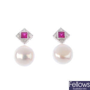 A pair of cultured pearl, diamond and ruby earrings.