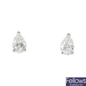 A pair of pear-shape diamond ear studs.