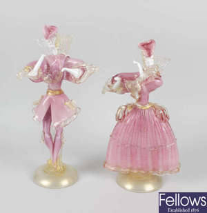 A pair of Murano pink and white mottle glass figures.