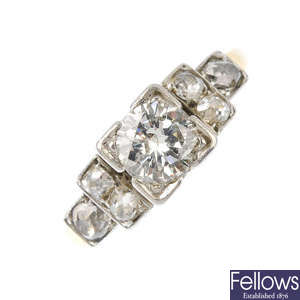 A mid 20th century gold and platinum diamond dress ring.