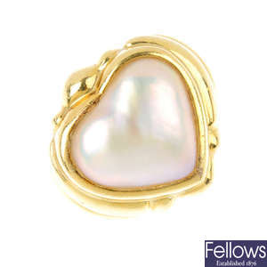 A mother-of-pearl ring.