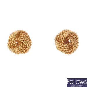 TIFFANY & CO. - a pair of 18ct gold knot earrings.