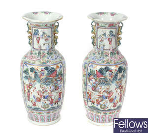 A pair of 19th century Cantonese Famille Rose pattern vases.