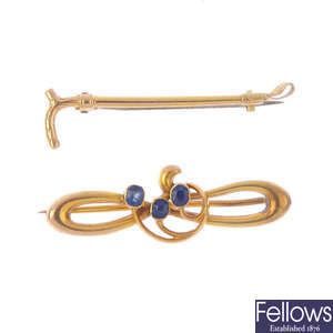 Two early 20th century 15ct gold gem-set brooches and a later ring.