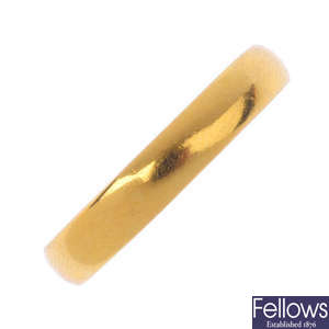 A gentleman's 1950s 22ct gold band ring.
