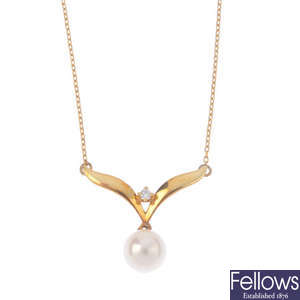 MIKIMOTO - a diamond and cultured pearl necklace.
