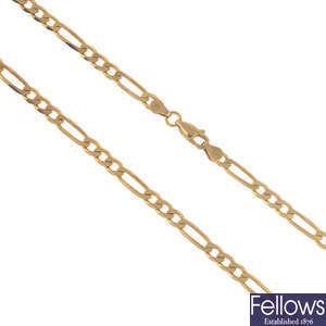 A 9ct gold chain and two 9ct gold pendants, each with a chain.