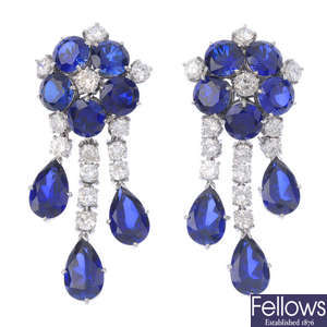 A pair of diamond and synthetic sapphire earrings.