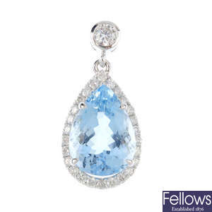 An aquamarine and diamond pendant.