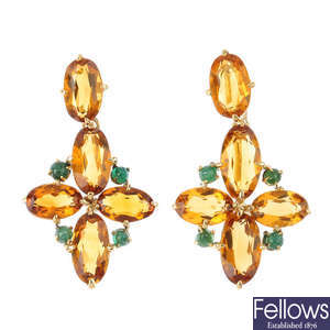 A pair of citrine and emerald earrings.