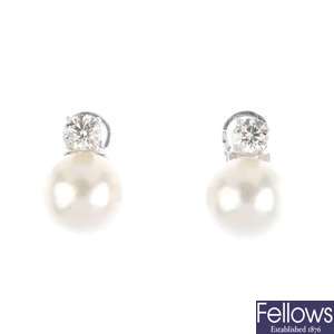 A pair of cultured pearl and diamond clip earrings.