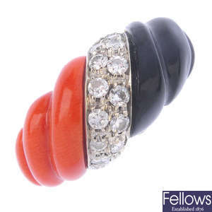 A coral, onyx and diamond dress ring.