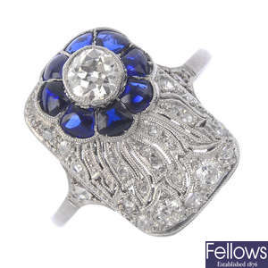 An Art Deco diamond and synthetic sapphire floral panel ring.