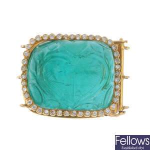 An 18ct gold emerald and diamond clasp.