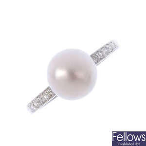 A natural saltwater pearl and diamond ring.