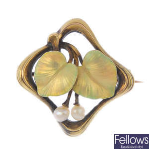 An early 20th century 14ct gold enamel and seed pearl brooch.