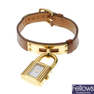 HERMÈS - a lady's gold plated Kelly wrist watch.