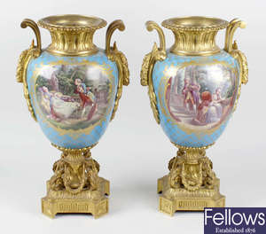 A fine pair of 19th century ormolu-mounted Sevres-style urns or vases