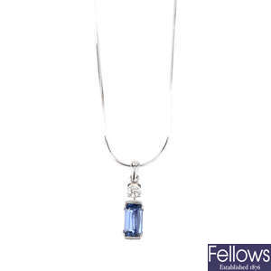 An 18ct gold sapphire and diamond pendant, with 9ct gold chain.