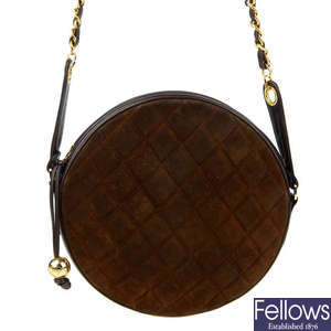 CHANEL - a vintage round quilted handbag.