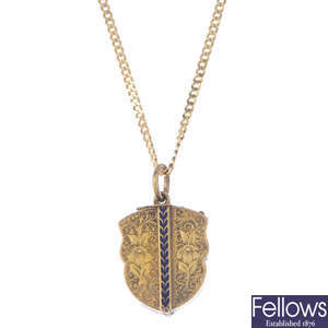 A late 19th century locket and later 9ct gold chain.