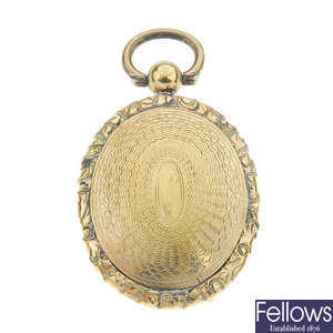 A late 19th century gilt miniature portrait pendant.