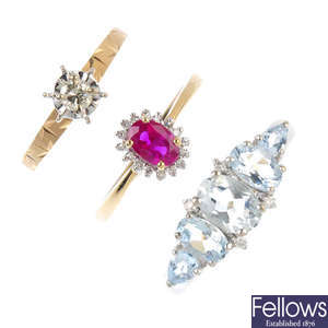 Five diamond and gem-set rings.
