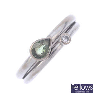 An 18ct gold green sapphire and diamond ring.