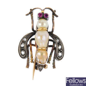 A cultured pearl, diamond and synthetic ruby fly brooch.
