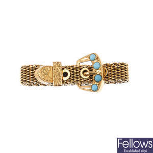 An early 20th century gold turquoise adjustable buckle ring.