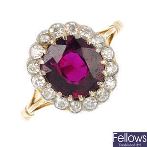 A mid 20th century gold Thai ruby and diamond cluster ring.