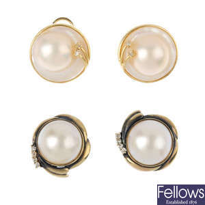 Two pairs of mabe pearl earrings.