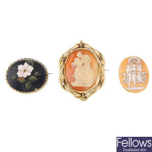 A pietra dura brooch, a ceramic panel and a selection of cameos.