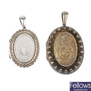 Two late Victorian silver oval lockets.