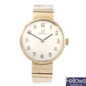 OMEGA - a lady's 9ct yellow gold bracelet watch.