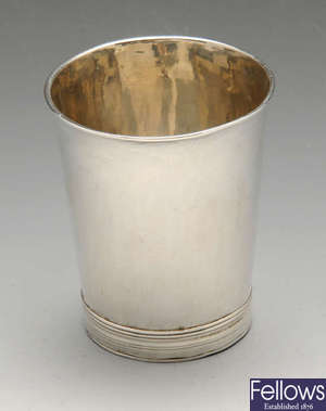 A William III Britannia silver beaker.