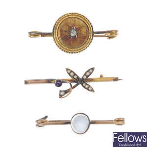 An 18ct gold opal ring, four brooches and an Omega watch.