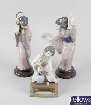 A set of three Lladro Japanese style figures.