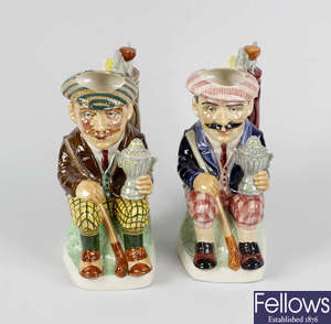 Golfing interest: A pair of Kevin Francis figures plus a suite of golf-related glassware.