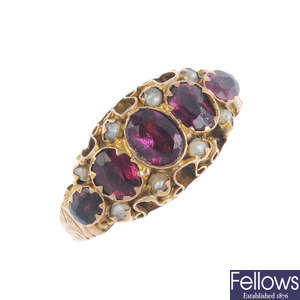 A late Victorian 9ct gold garnet and split pearl ring. 