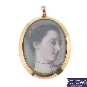 An early 20th century 15ct gold portrait pendant