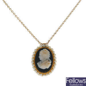 An onyx cameo necklace.