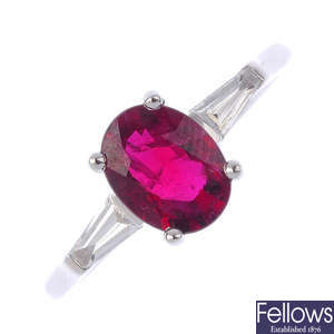 An 18ct gold ruby and diamond single-stone ring.