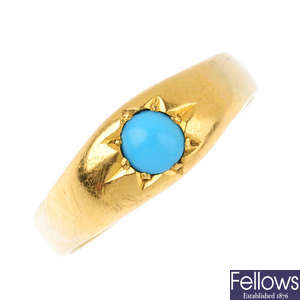 A 22ct gold turquoise single-stone ring.