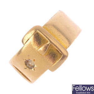 A late Victorian 18ct gold gem-set buckle ring.