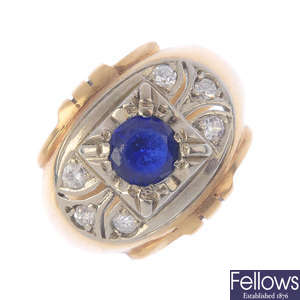 A mid 20th century gold, synthetic sapphire, diamond and paste dress ring.