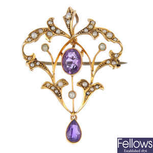 An early 20th century amethyst and split pearl brooch.